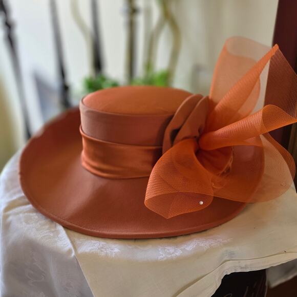 NIB Tania Bella burnt‎ orange hat, with satin rose and mesh, gems